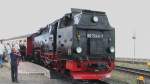 Am Montag, 14. August 2006 steht um 10:57 Uhr Lok 99 7240-7 der Harzer Schmalspurbahnen am Bahnhof Brocken.