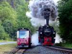 99 5906-5 und VT 187 019 bei einer Planmigen Doppelausfahrt aus dem Bahnhof Alexisbad ! Bis zur Streckenverlngerung nach Quedlinburg konnte man im Sommerfahrplan diese Ausfahrt Freitags und Samstags mit Dampfzug erleben ! Der neue (wie finde ziemlich beschi... Fahrplan)lsst das leider nicht mehr zu!