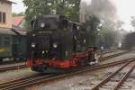 Nachdem 99 1777 am Nachmittag des 31.08.2012 ihren Zug P3008 aus Radebeul im Bahnhof Radeburg abgeliefert hat, ist sie jetzt auf Rangierfahrt ins Bw, um Wasser fr die Rckfahrt zu nehmen.