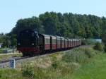 Dampflok 99 2323-6 mit dem Molli am Haken erreicht in Krze Khlungsborn Ost. 21.7.2013