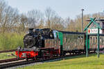 Lok 99 4801 mit dem Rasender Roland in Putbus einfahrend. - 07.04.2024
