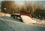Im verschneiten Bahnhof Putbus stande dieser Schneepflug im Dezember 1998.Der Schneepflug kam obwohl es geschneit hatte nicht zum Einsatz.