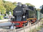 Am 30.September 2009 war Binz schon fr 99 4011 Endstation,denn Sie brachte an diesen Zug einen Personenzug von Ghren der nur bis Binz fuhr nach Binz.