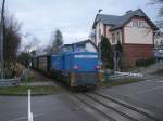 251 901 als Schlußlok am ausfahrenden P 102 Göhren-Lauterbach Mole,am 02.Januar 2014 auf dem Dreischienengleis bei der Ausfahrt aus Putbus.