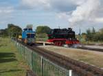 Während 251 901 als Schlußlok an den eingefahrenen Zug aus Göhren fuhr,fuhr die 99 4802 Lz,am 11.August 2014,aus Putbus.