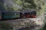 99 1771 am 07.10.2011 mit ihrem Planzug zurck nach Freital-Hainsberg, kurz vor Erreichen des Bahnhofes Rabenau.(Fr alle Foto-Spezialisten: Ich habe fr diese Aufnahme ganz bewut mal einen