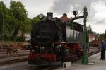 99 1734 am 08.06.2012 beim Wasserfassen im Bf. Dippoldiswalde. Eine kurze Durchsicht gehrt bei der immerhin 84 Jahre alten Maschine selbstverstndlich auch dazu!