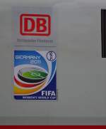 Abfotografiert von einem ICE i Bahnhof Hannover Messe/Laatzen: Der  rote Riese  als Frderer der Frauen Fuball WM 2011 in Deutschland. Mal schauen, ob die Damen ein Sommermrchen hinkriegen! :) Aufgenommen am 05.03.2011.