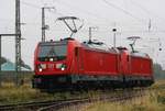 DB 147 012-9 und 147 014-5 von Berlin kommend Richtung Stralsund beim Betriebshalt in Anklam Höhe Asig nahe Hafenstrasse.