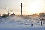 ein Wintertag geht zur Neige und die  kleine RE  verlt Stralsund Richtung Grimmen am 19.12.09