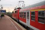 Der Vesuch eines Stimmungsbildes zum Sonnenuntergang, die 111 013-9 mit RE4 nach Aachen in Dortmund HBF am 18.09.2010