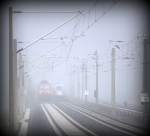 eine Begegnung der unheimlichen Art am km 105,2 in Radebeul West, der erste Herbstnebel machts mglich.