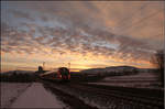 Sonnenaufgang im Winter -    S-Bahn bei Weinstadt-Endersbach im Remstal.