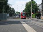 Endhaltestelle  K�nigsforst  der Linie 9 am 4.6.13: Links TW 4077 (vorne) und TW 40?? (hinten) sind gerade aus Richtung S�lz angekommen, wo hin sich TW 40?? (vorne) und TW 4022 (hinten) in K�rze auf den Weg machen werden.