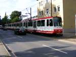 Eine Doppeltraktion aus Stadtbahnwagen B der Dortmunder Stadtwerke in der Ortsdurchfahrt von Lnen-Brambauer als Zug der Linie U41 nach Dortmund-Hrde am 19.