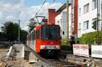 B-Wagen 2111 steht an der provisorischen eingleisigen Haltestelle Margaretastrae (rechts) am 16.05.2012. Auf der linken Seite ist schon der neue Mittelbahnsteig zu erkennen. Wagen 2111 hat vor ein paar Tagen seine alte Ganzreklame  Homepark  entfernt bekommen.