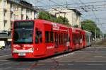 Niederflurwagen 4092 auf der Kreuzung Aachener Str./Grtel mit einer neuen Ganzreklame fr das Mbelhaus  Hffner  am 30.05.2012