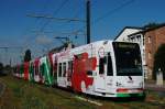 Niederflurwagen 4012 in Weiden auf der Aachner Strae auf Hhe des Frechener Weges mit neuer Ganzreklame fr das NRW Chinafest am 27.08.2012