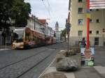 Am 20.8.13 konnten TW 4069 unterwegs mit einem weiteren Fahrzeug  als Linie 9 Richtung Slz an der Haltestelle Mauritiuskirche fotografiert werden. Im Hintergrund ist der Kirchturm von St. Aposteln.