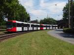 Diese beiden unbekannten Wagen waren am 12.6.14 als Linie 3 Richtung Mengenich unterwegs. Der Zug fährt gerade von der Karlsruher Str. auf den Pfälzischen Ring.