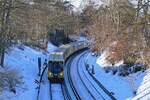 U3 der BVG Berlin, Typ HK06 / 1023-4,  hier durch das winterliche Berlin, Richtung Warschauer Str. im Januar 2026.