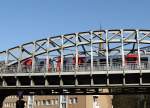 Ein DT5 der Hamburger U-Bahnlinie 3 überquert die Schürbeker Straße, kurz vor der Haltestelle  Mundsburg .