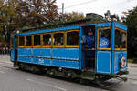 Nostalgie Wagen 256 auf der Maximilansbrücke bei der Parade zum 150 Geburtstag der Münchener Straßenbahn.
