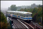 Olympiazug Wagen 6145 fährt hier als U 6 am 4.10.2005 um 9.44 Uhr in München Garching ein. Damals war Garching noch Endstation der U 6 in Richtung Flughafen, so dass die Züge das Gleis wechseln mussten, um zurück nach München fahren zu können.