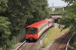 DT2-Doppeltraktion gefhrt vom Wagen 550 am 03.08.2011 beim Verlassen des U-Bahnhofs Messe.