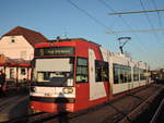 Die Bahn  2211  der RNV trägt immer noch die früheren Farben der  VBL .