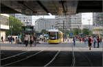 Berlin-Alexanderplatz -    U-Bahn-Aufzug, Flexity-Tram und Weltzeituhr.