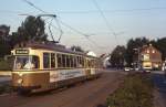 Dormund Tw 203 mit Beiwagen 812 auf seiner morgendlichen Runde im Schlerverkehr am Wambeler Hellweg, 29.06.1992.