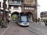 Freiburger VAG Siemens Combino Basic 277 (Fürstenberg Bier Vollwerbung) am 22.03.17 in der Innenstadt