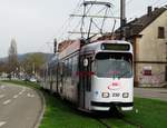 Freiburger VAG Düwag GT8N Wagen 230 am 24.03.17 in Neubaugebiet von einen Gehweg aus fotografiert