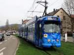 Freiburger VAG Düwag GT8K Wagen 212 mit Pepsi Vollwerbung am 24.03.17 in Neubaugebiet von einen Gehweg aus fotografiert