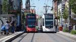 Straßenbahn mit Begegnungen CAF Urbos Nr. 308 und Nr. 312 erreichen die Haltestelle Stadttheater - Aufgenommen am 02.06.2019