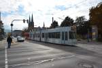 Diese Duewag GT8Z mit der Nummer  256  fährt am 18.10.2015 auf der Linie 3 durch Freiburg im Breisgau.