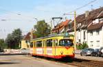 Wagen 214 hat gerade die Endstelle Rintheim verlassen und fhrt richtung Innenstadt.