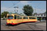 Wagen 206 der krzlich ohne Werbung und mit Neulack durch Karlsruhe fhrt biegt am 12.07.11 in die Haid und Neu Strae ein und erreicht die Haltestelle Hauptfriedhof.