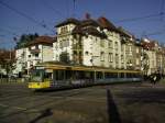 Wagen 307 der VBK berquert am 30.10.2011 vor schner Kulisse den Weinbrennerplatz in Karlsruhe, seine Fahrt fhrt ihn ins sdliche Oberreut.