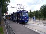 Die Leipziger Verkehrsbetriebe bauen in der Jahnallee einen Straenbahntunnel, damit dort die Straenbahn den Autoverkehr am Fuballstadion zur WM 2006 nicht behindert. Fr die gesamte Bauzeit gibt es dort parallel zur alten/ neuen Strecke eine 600m lange Interimsstrecke. Hier steht eine Linie 7 am  Waldplatz .