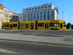 LVB: NGT8, Betriebsnummer 1128 mit DHL-Werbung im Stadtzentrum Leipzig am 04.05.2014