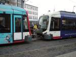 Zwei moderne Straenbahnen in Heidelberg Hbf am 14.01.11 Dies ist bei diesen Straenbahnen sehr selten dort.