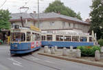 München MVV Tramlinie 19 (M5.65 2614 + m5.65 3512) Pasing, Marienplatz im Juli 1992. - Das Bild zeigt die M5+m5-Garnitur in der Wendeschleife am Pasinger Marienplatz. Zu der Zeit hatte die Linie 19 am Marienplatz ihre Endstation, und der Platz selber gab für die Wendemöglichkeit Raum. - Scan eines Farbnegativs. Film: Kodak Gold 200-3. Kamera: Minolta XG-1.