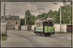 Museumstriebwagen 21 kam gerade von einer Sonderfahrt hier bei der einfahrt zum Betriebshof Wiesenstr.Foto entstand am 19.04.14 und an der einfahrt des Betreibshof