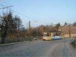 Triebwagen 32 ist am nachmittag des 27.03.2002 zwischen Woltersdorf Schleuse und dem Thlmannplatz als Solotriebwagen unterwegs.