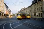 Wrzburg WSB SL 1 / SL 2: Die Gelenktriebwagen 244 und 275 treffen sich am Morgen des 25. Juni 1979 auf der Juliuspromenade.