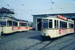 VAG Freiburg___Betriebshof Nord (Komturstraße)__Tw 102 [GT4  Sputnik ,Rastatt 1958, erster Freiburger Gelenkwagen-Typ] und Tw 122 [GT4, Rastatt 1968, 1994 nach Nordhausen abgegeben].__20-04-1974 