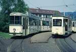 VAG Freiburg___Tw 203 [DUEWAG;GT 8,1972,GEAMATIC] und Linienzug der Linie 4 [GT4 + Bw 241] in der Endschleife Littenweiler.___20-04-1974