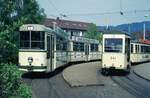 VAG Freiburg___Tw 203 [DUEWAG;GT 8,1972,GEAMATIC] und Linienzug der Linie 4 [GT4 + Bw 241] in der Endschleife Littenweiler.___20-04-1974